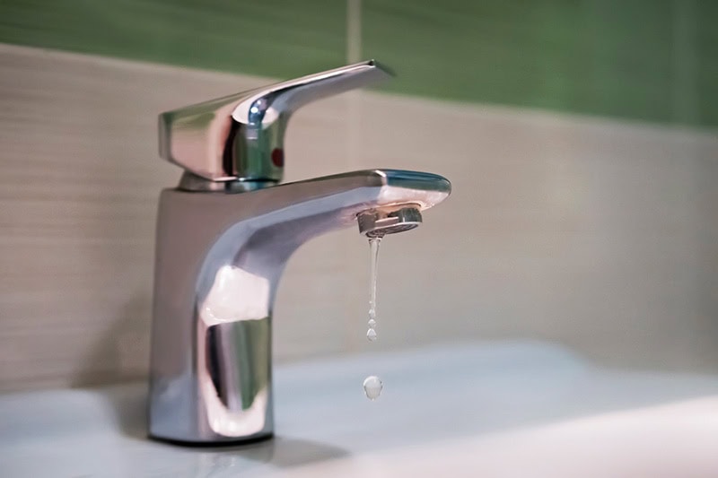 Faucet leaking water in Gary, Indiana, home.